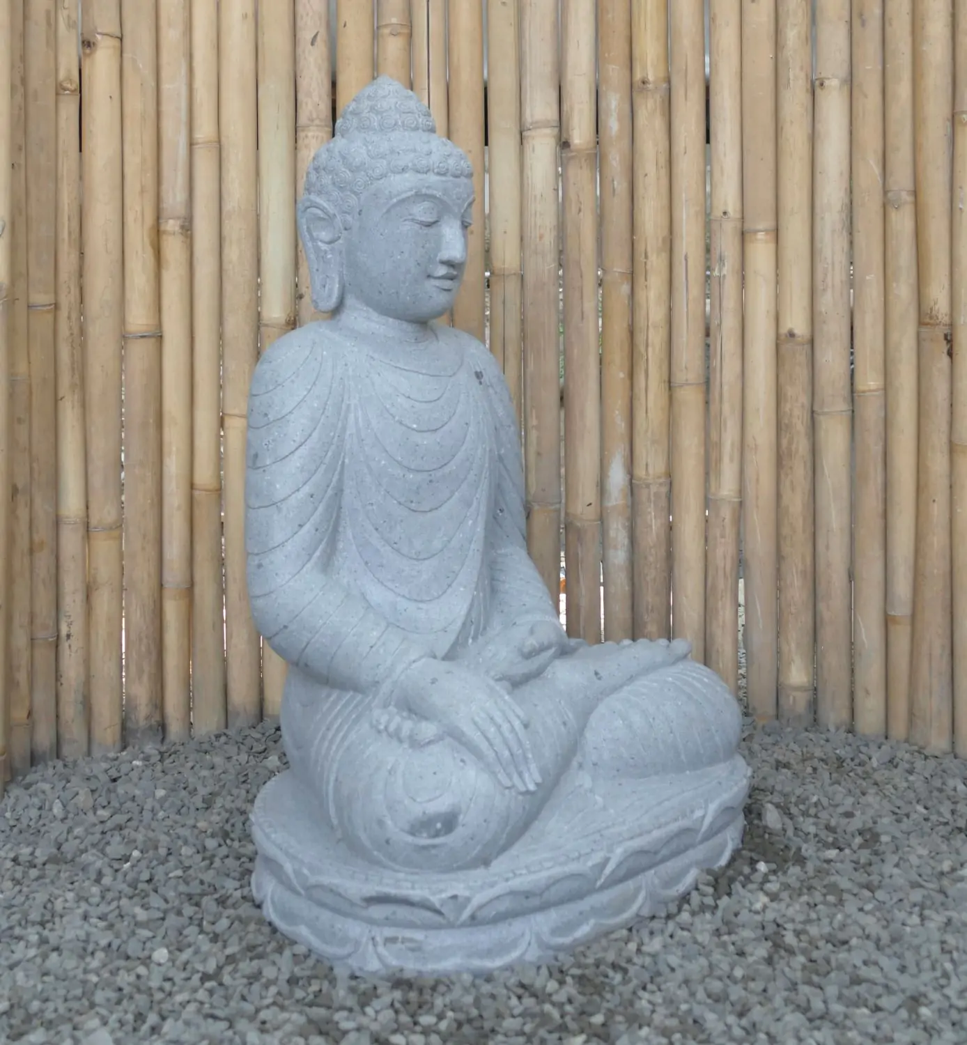  Product image 3 of the product “Seated Buddha made of Riverstone in Bhumisparsha - gesture of touching the earth. 89cm height. ”